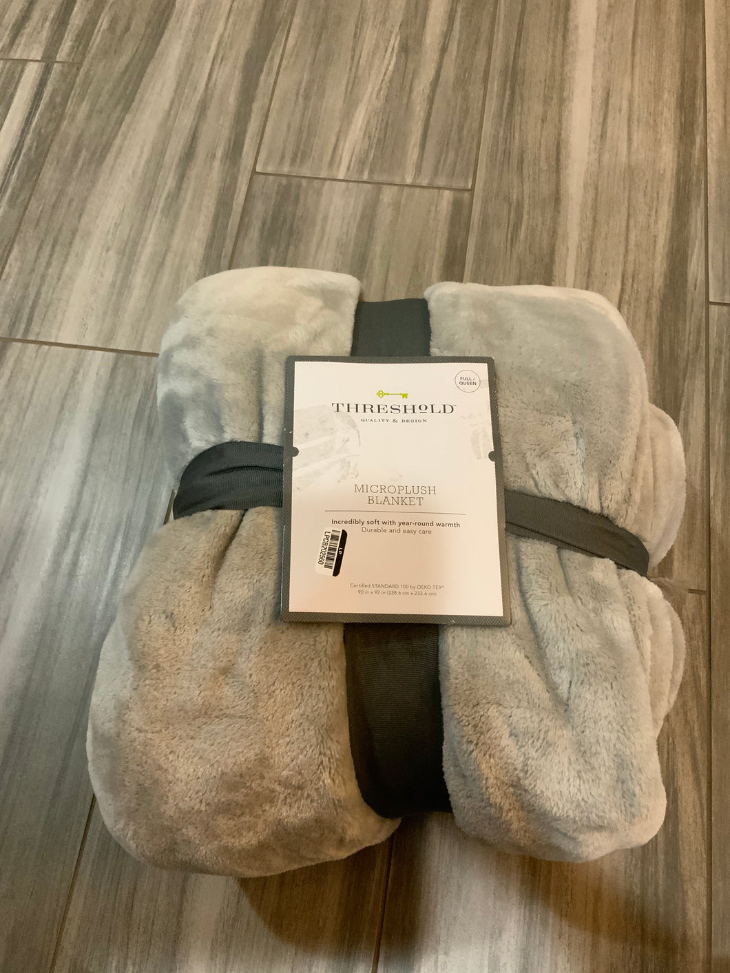 Threshold micro plush blanket